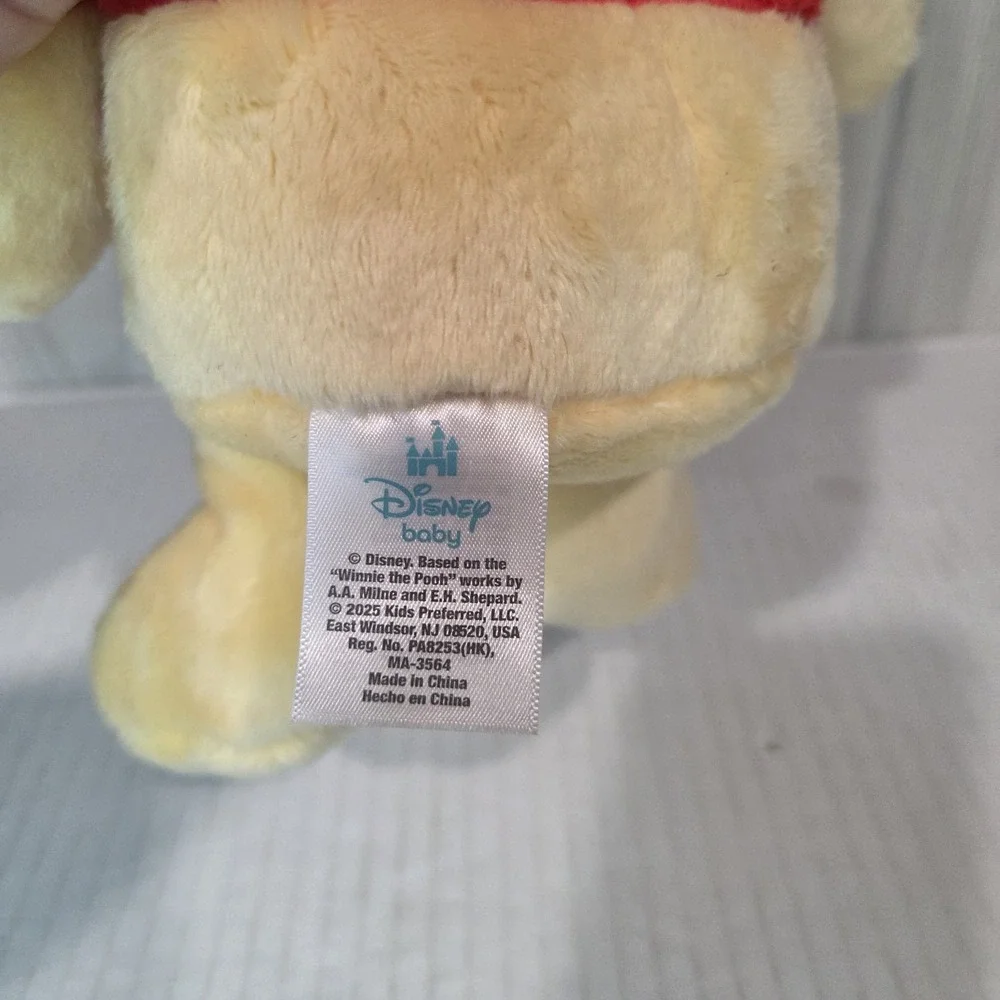 Disney Baby Winnie the Pooh Stuffed Animal, crinkle hands, heart emblemed